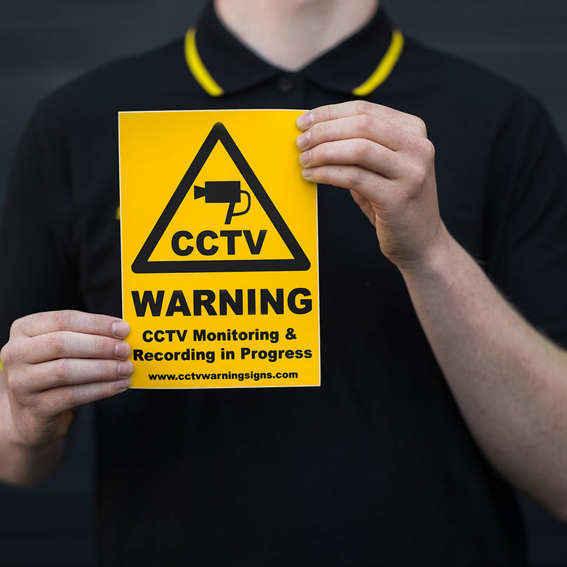 Warning these premises are protected by CCTV camera sign post Warning these premises are protected by CCTV camera sign post